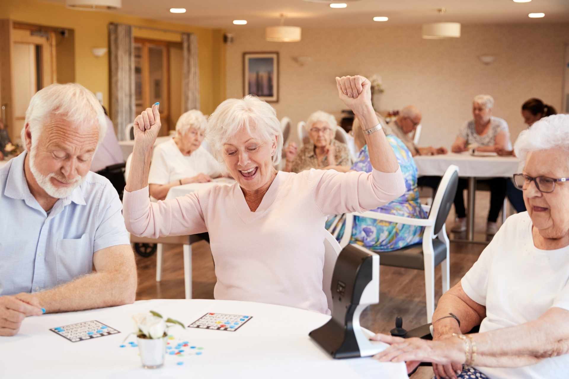 Senior woman winning a game.